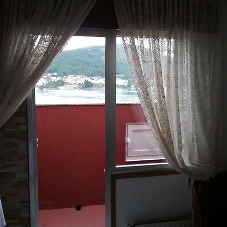Atico Vacacional Apartment Muros Exterior foto